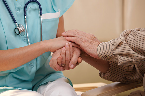 Physician caring for patient
